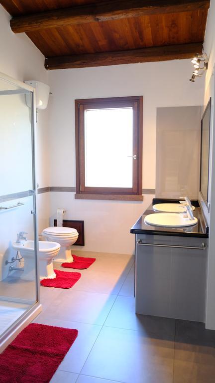 La Baia Casa Vacanze Portoscuso Esterno foto